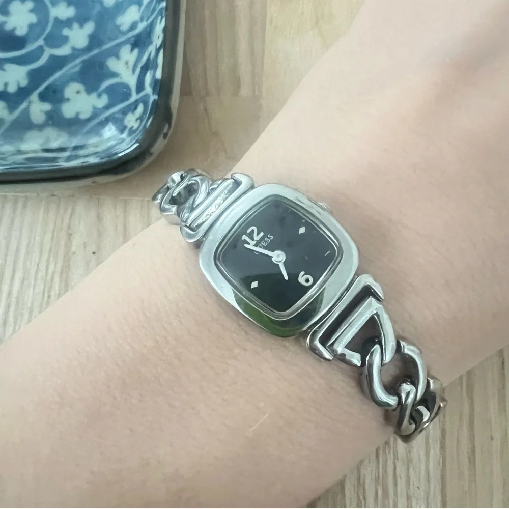 Guess ladies rectangular black dial silver tone  bracelet watch NEW BATTERY